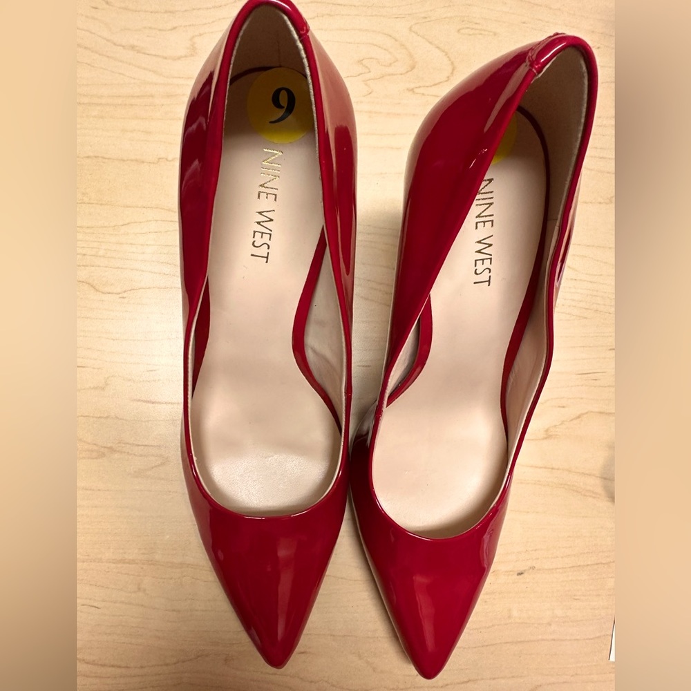 NINE WEST red shiny pointy-toed red pumps. Size 9M. Worn once. Like new